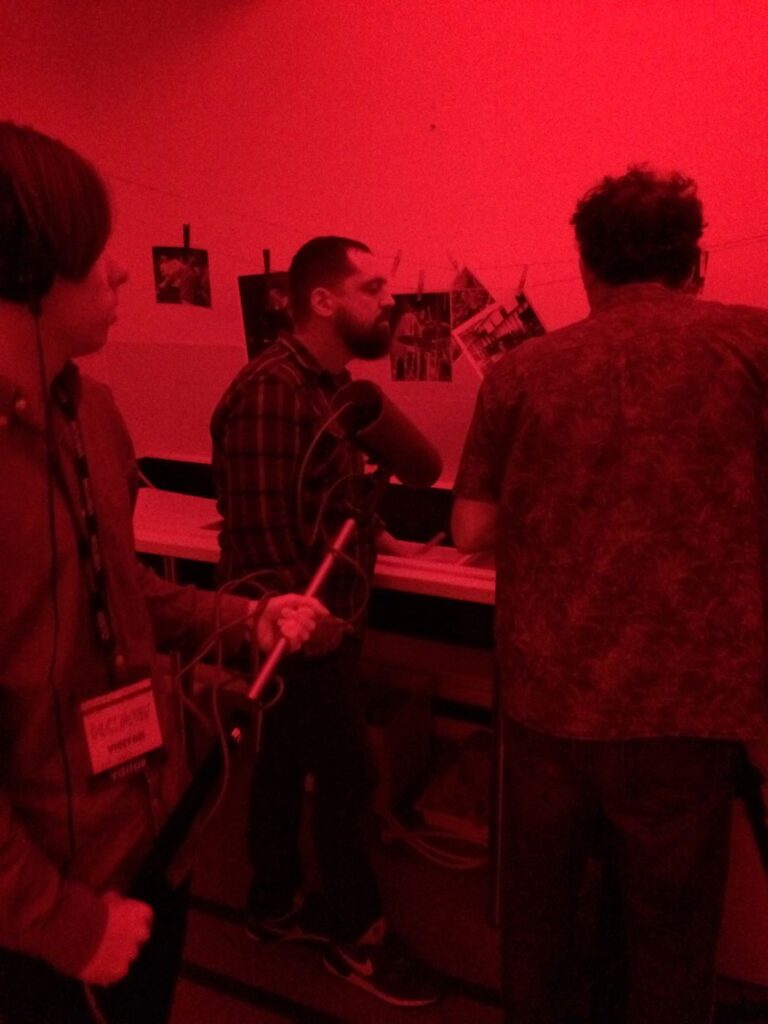 1543495318-HCA filming in dark room with student vol 1