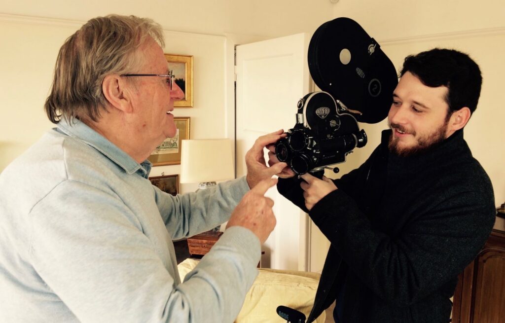 1543496257-Intern Michael Kenny – Keith James demonstrates old 16mm news camera Oct 31st 2018