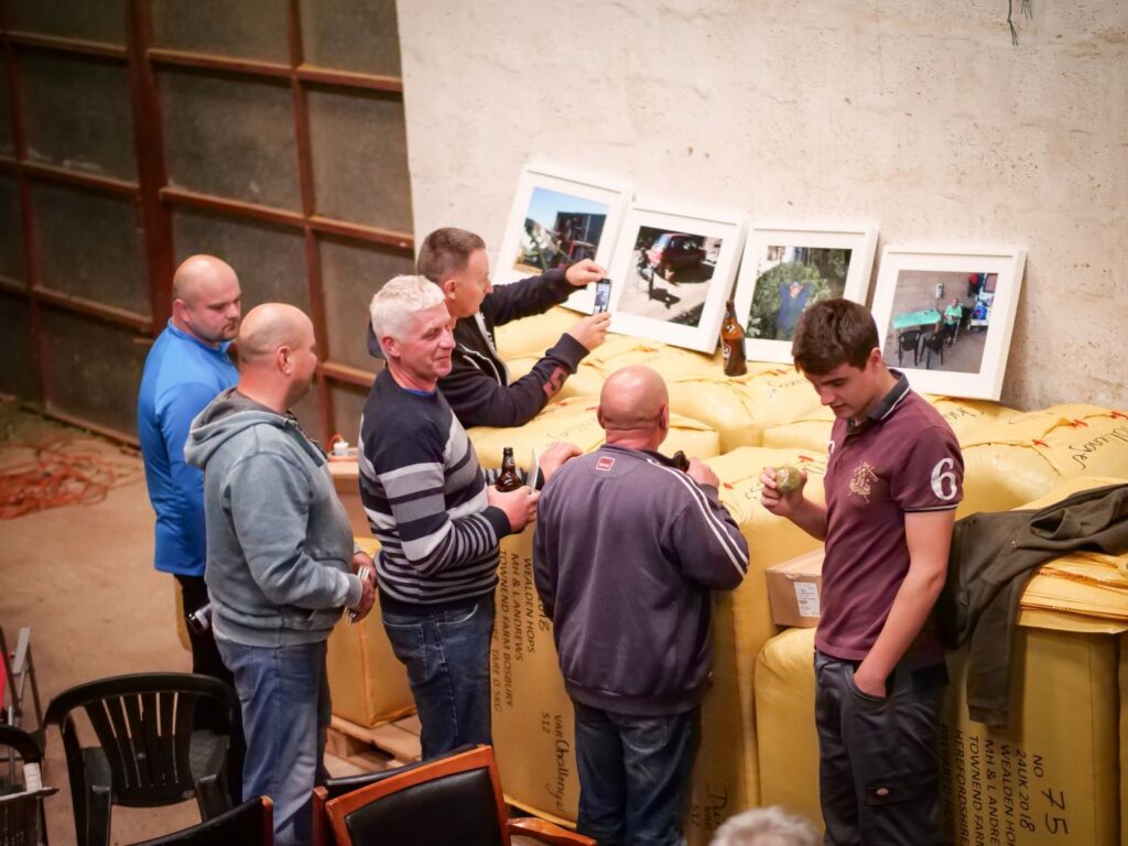 1543501762-Townend farm post-screening Sept 2018 Polish workers take photos of the temp exhibition