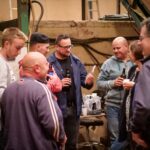 1543502583-Townend farm post-screening Sept 2018 Polish worker looks at his complimentary DVD 2